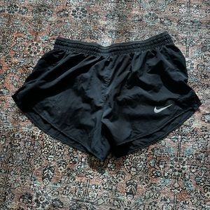 Black Nike running shorts